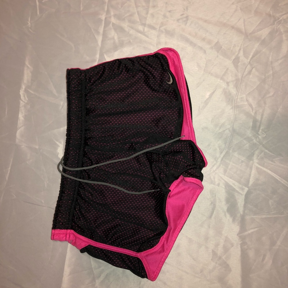 black and pink nike shorts